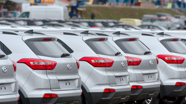 Minsk, Belarus. Mar 2020. Hyundai cars parked in row the parking lot of an authorized dealer. New cars on holding yard. Silver Hyundai Creta, ix25 vehicles on the parking in row. New cars for sale