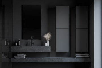 Sink and cabinets in grey bathroom