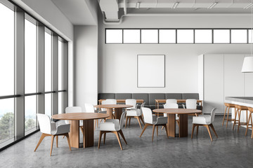 White restaurant interior with poster