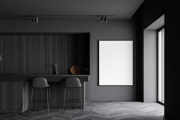 Gray and wood kitchen with bar and poster