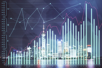 Financial graph on night city scape with tall buildings background multi exposure. Analysis concept.