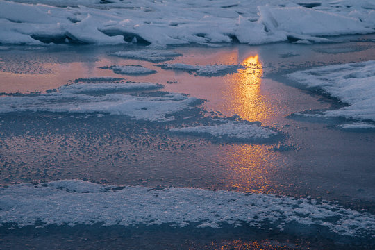 Reflection of the sun on the frozen Lake Sevan , Armenia