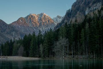 Mountains with the lake on the front and forest