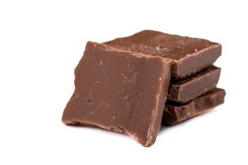 Chocolate cubes isolated on white background.Copy space