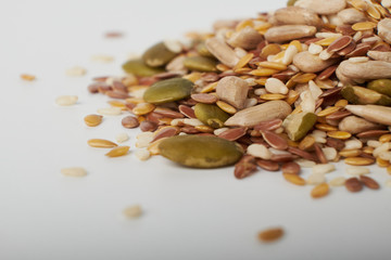 various seeds for healthy food close- up, pumpkin, sunflower, flax and sesame