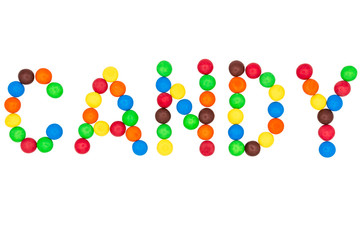 The inscription sweetness is laid out with colored candies