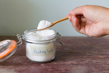 Jar and spoonful of baking soda