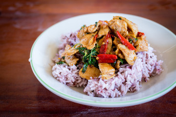 Rice topped with stir-fried pork and basil
