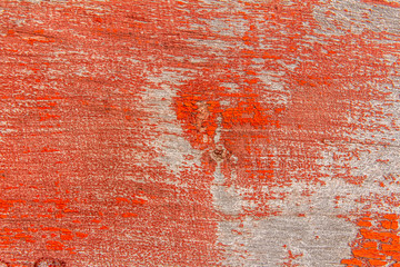 Texture of peeling paint on a wooden Board