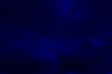 Dark blue clouds in the night sky