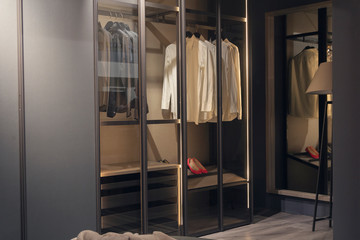 Comfortable modern wardrobe in the bedroom. Interior