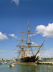Fototapeta na wymiar HMS Warrior in Portsmouth harbour , UK . The first iron clad warship 
