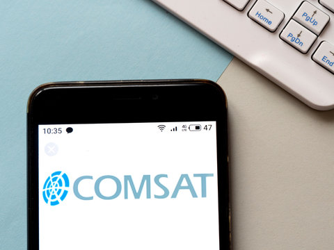 In this photo illustration Communications Satellite Corporation (COMSAT) logo is seen displayed on a smartphone