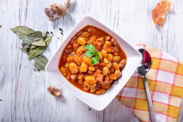 Baked beans in tomato sauce with chopped sausage