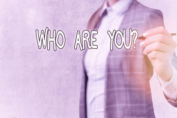 Conceptual hand writing showing Who Are You Question. Concept meaning asking about someone identity...