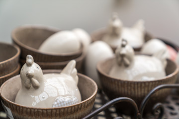 Porcelain and ceramic Easter decorations in a garden center.