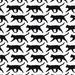 Silhouettes of cats. Black and white seamless pattern