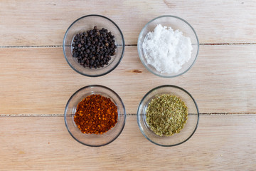 various spices on wooden table