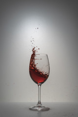 red wine splash in glass