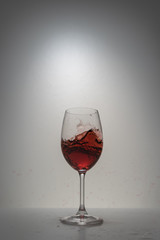 red wine splash in glass