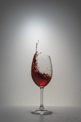 red wine splash in glass