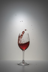 red wine splash in glass