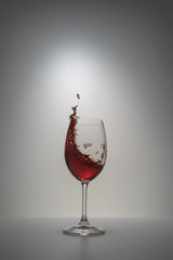 red wine splash in glass