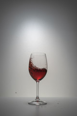 red wine splash in glass