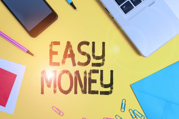 Conceptual hand writing showing Easy Money. Concept meaning money that is easily have and sometimes...
