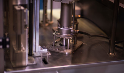Close-up of the cylinder block in the light blue scene.Automotive part,machine part .