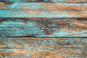 Fototapeta na wymiar Weathered blue wooden background texture.