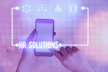 Conceptual hand writing showing Hr Solutions. Concept meaning all the technology businesses use to...