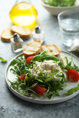 Homemade burrata cheese salad with tomatoes