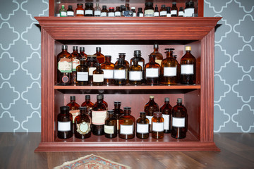 Bottles on the shelf in old pharmacy