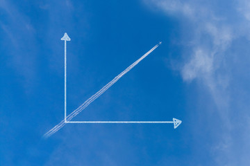 Flying airplane on the blue sky in graph Creative business concept.