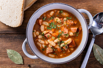 Baked beans in tomato sauce with chopped sausage