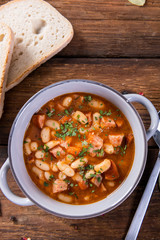 Baked beans in tomato sauce with chopped sausage