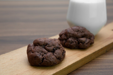 Chocolate cookies on wooden table