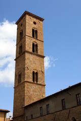 Fototapeta na wymiar Volterra (SI), Italy - April 25, 2017: Bell Tower of Duomo, Volterra, Tuscany, Italy
