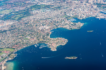 Aerial cityscape of Sydney inner suburbs, bays and beaches