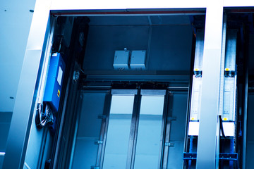 lift welding elevator fasteners in lift shaft © Denis Starostin