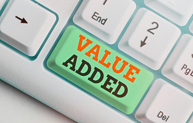 Conceptual hand writing showing Value Added. Concept meaning the extra value created over and above...