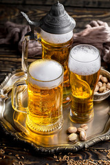 Light beer in a glass on the table