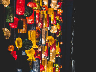 Colorful lamps in the market at night.