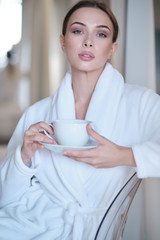 stay home, woman at home is holding a coffee cup, Quarantine epidemic