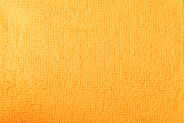 Orange Microfiber Cleaning Cloth Texture Background Top View