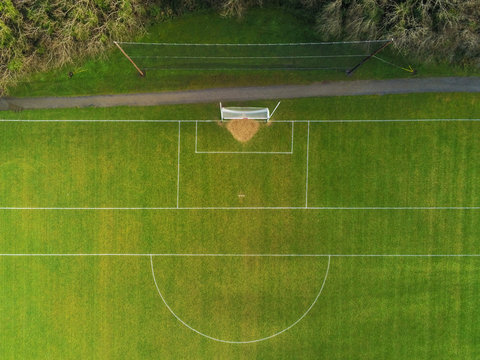 Aerial View On A Sport Training Field For Irish Sports With Goal Posts For Football Soccer, Rugby, Hurling And Camogie.