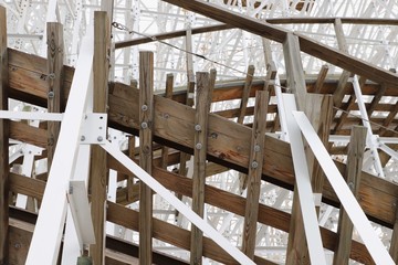 Mixture of wooden & steel structure supporting roller coaster