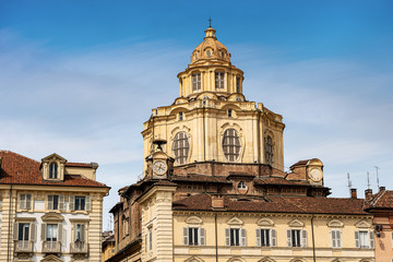 Fototapeta na wymiar Real Chiesa di San Lorenzo with the dome. Ancient church in Baroque style (XVII century) in Turin downtown, UNESCO world heritage site. Piedmont, Italy, Europe