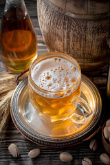 Light beer in a glass on the table